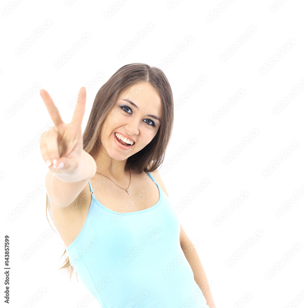 Beautiful young woman posing and showing two thumbs up