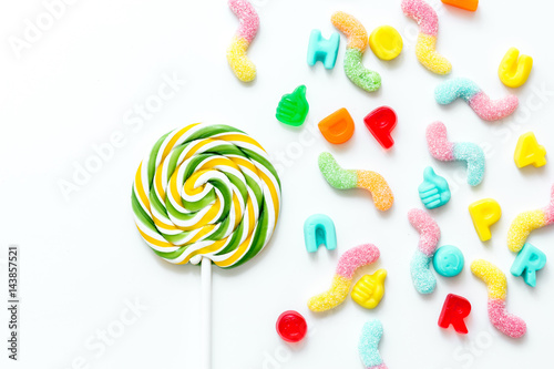 lollipop design with sugar candys on white background top view mockup
