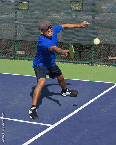 Male Pickleball Player in Action © Bob