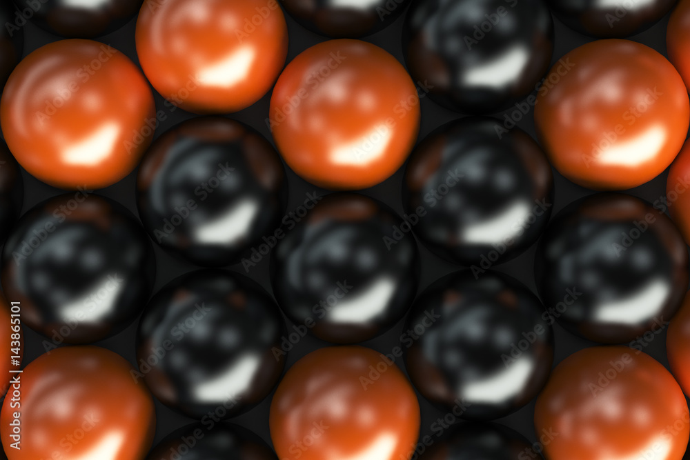 Pattern of black and orange spheres