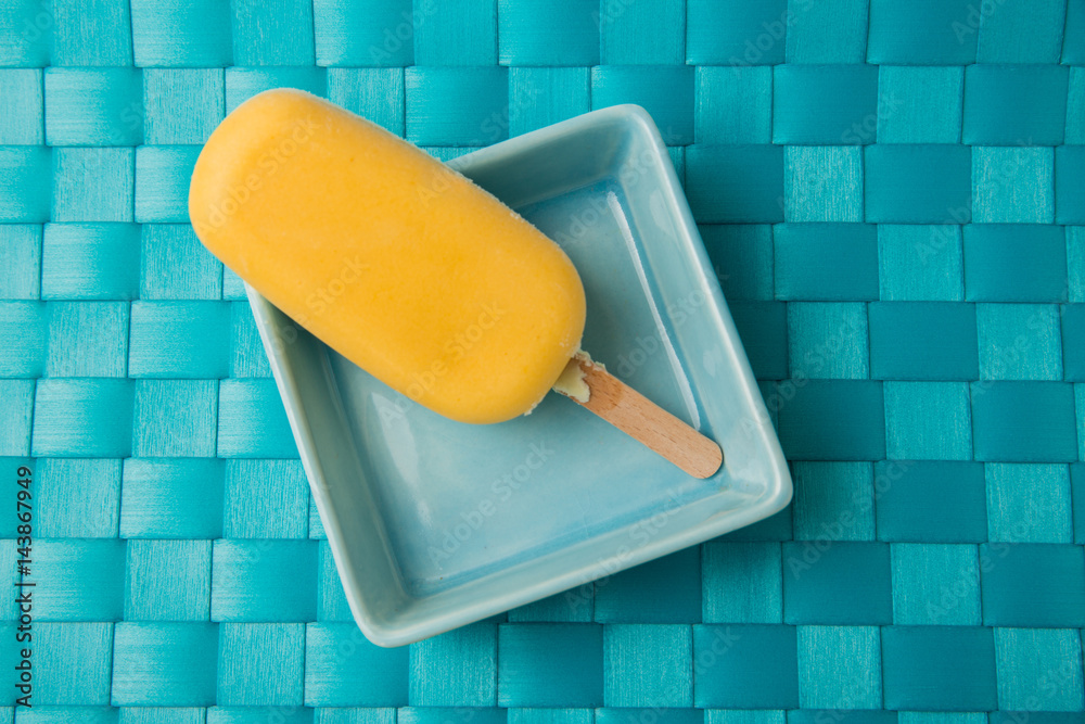 Stieleis mit Mangoeis und Vanilleeis Stock Photo | Adobe Stock