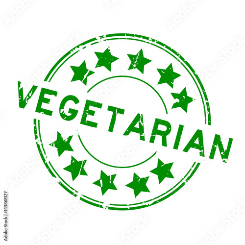 Grunge green vegetarian with star icon round rubber seal stamp on white background
