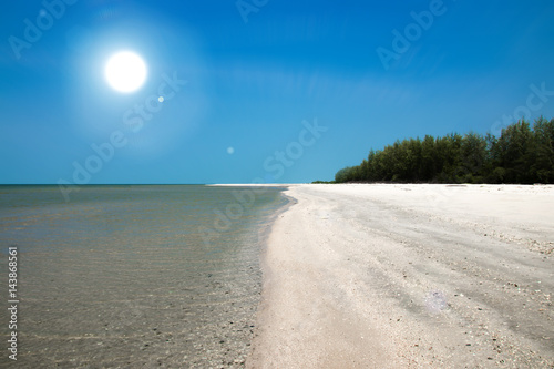 Fototapeta Naklejka Na Ścianę i Meble -  Alone on the beach with sun.