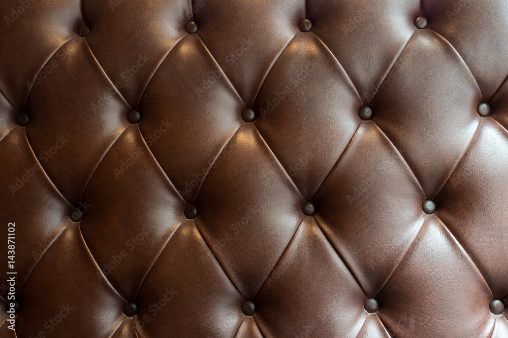 Naklejka premium leather upholstery background for a luxury decoration