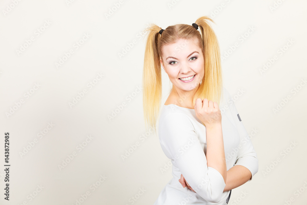 Happy blonde teenager girl with ponytails Happy blonde teenager girl with ponytails
