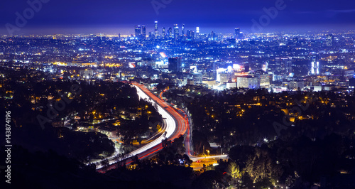 Slika na platnu Los Angeles city skyline and highway 101 viewed from West Hollywood hills or heights