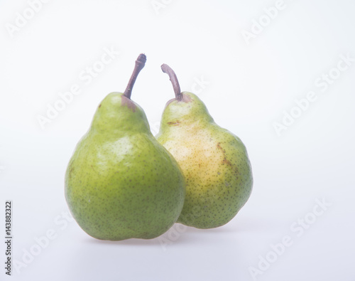 pears or two green pears on a background.