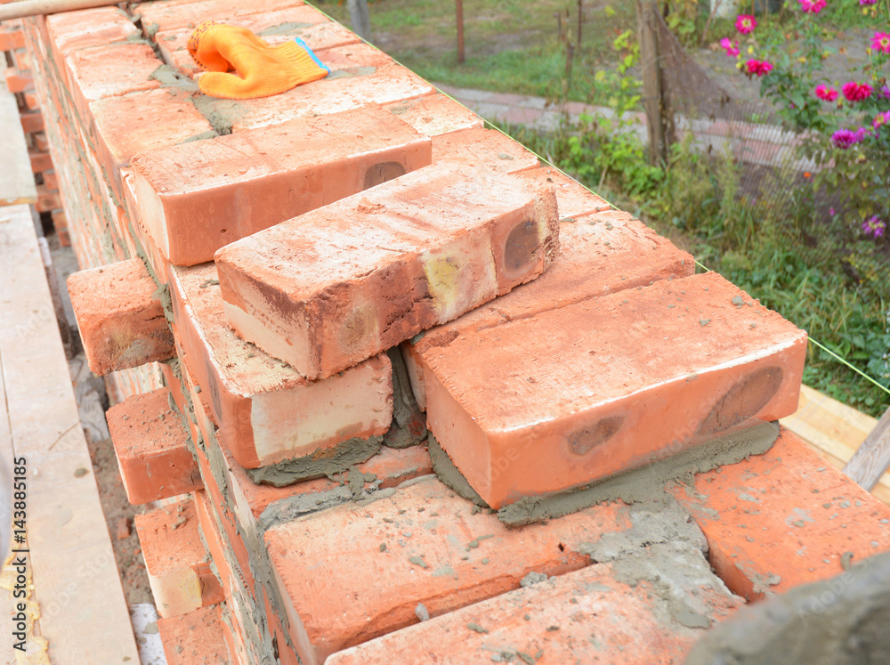 Bricklaying, Brickwork. Bricklaying on House Construction Site