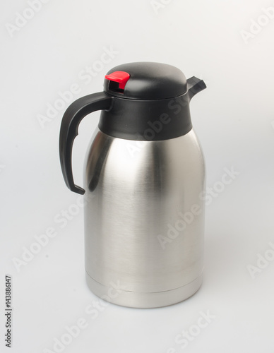 Thermo or Thermo flask from stainless stee on background.