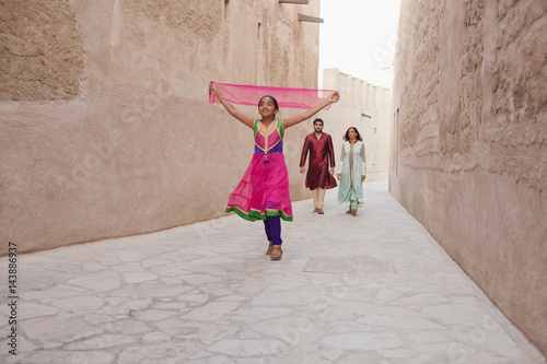 Family walking on alley at Bur Dubai.