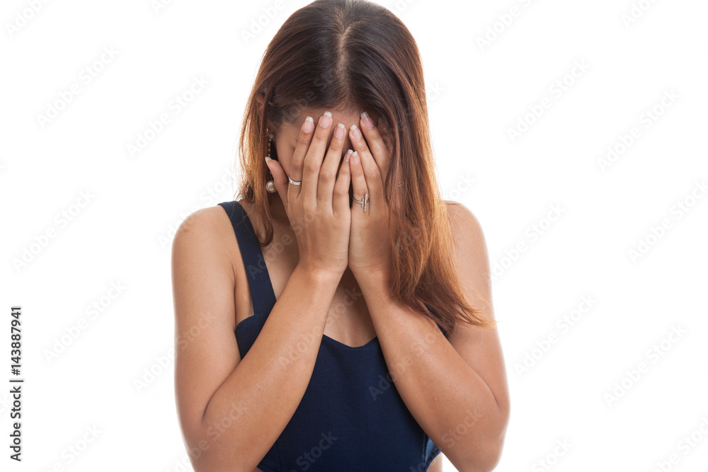 Sad young Asian woman cry with palm to face. Sad young Asian woman cry with palm to face.