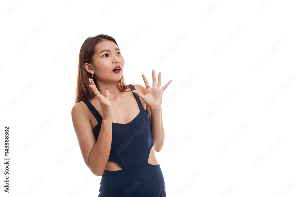 Beautiful young Asian woman shocked and look up. Beautiful young Asian woman shocked and look up.