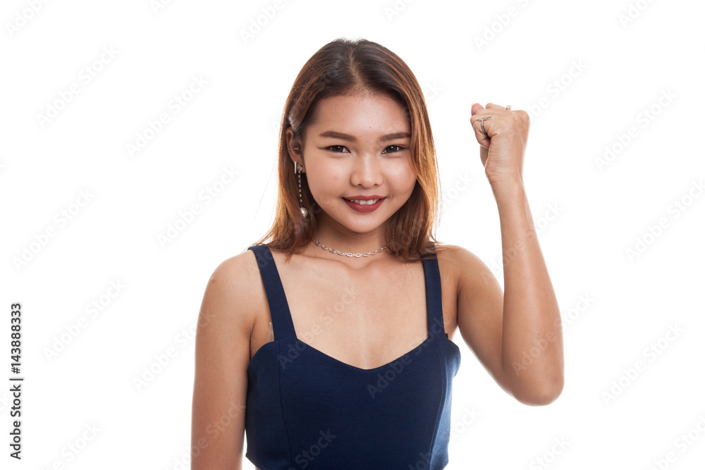 Successful young Asian woman hold fist up. Successful young Asian woman hold fist up.