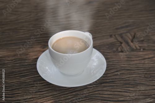 Coffee cup on wood table