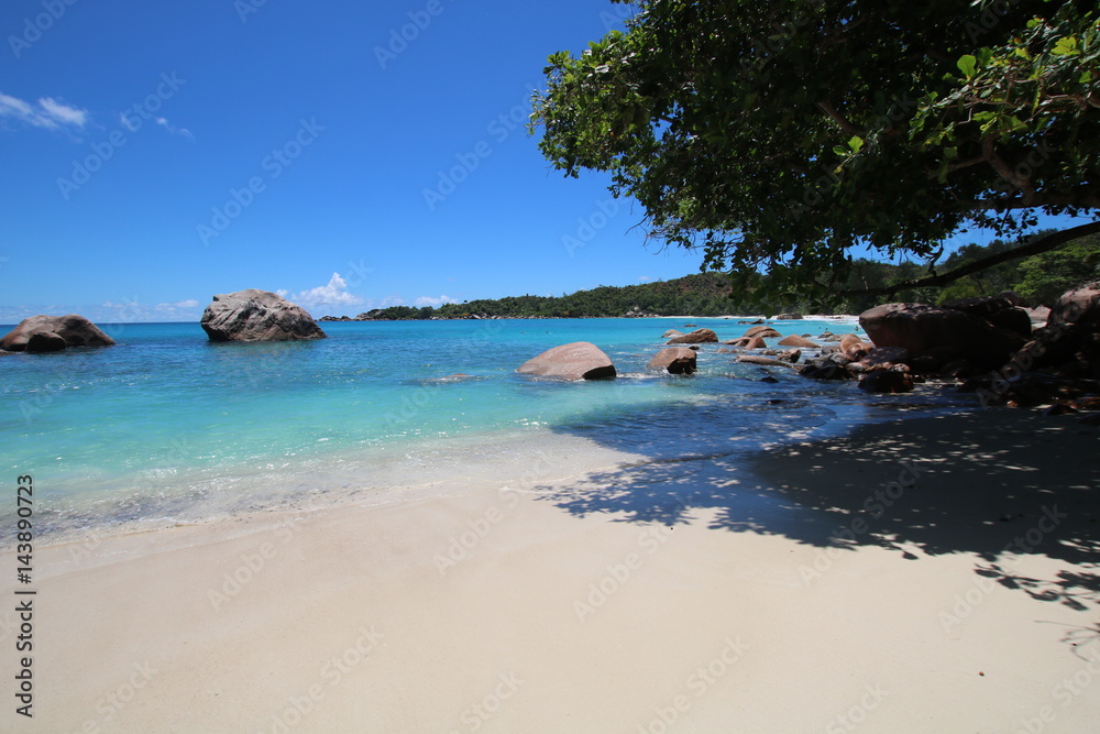 Beach Anse Lazio, Praslin Island, Seychelles, Indian Ocean, Africa / The beautiful white sandy beach is bordered by large red granite rocks.