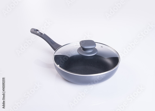 pan or stainless steel pan on background.