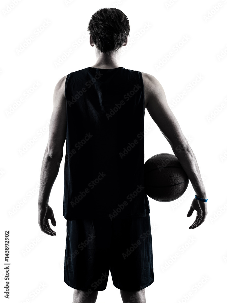 Fototapeta premium one caucasian basketball player man isolated in silhouette shadow on white background