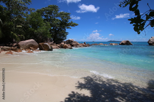 Beach Anse Lazio  Praslin Island  Seychelles  Indian Ocean  Africa   The beautiful white sandy beach is bordered by large red granite rocks. 