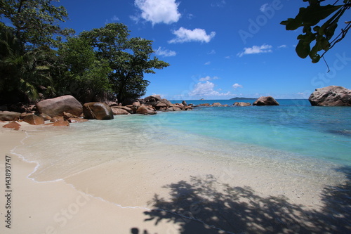 Fototapeta Naklejka Na Ścianę i Meble -  Beach Anse Lazio, Praslin Island, Seychelles, Indian Ocean, Africa / The beautiful white sandy beach is bordered by large red granite rocks. 