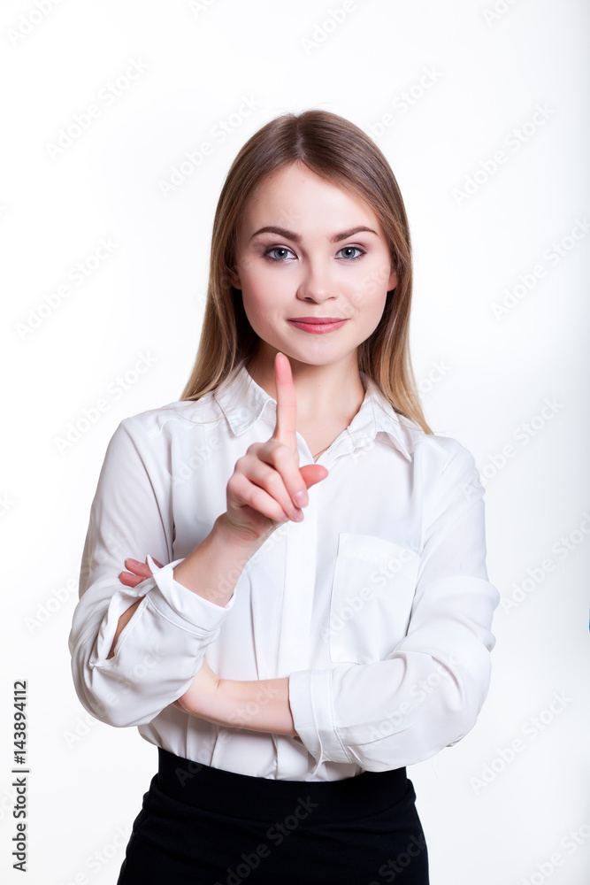 Young attractive business girl on a white background showing signs Young attractive business girl on a white background showing signs