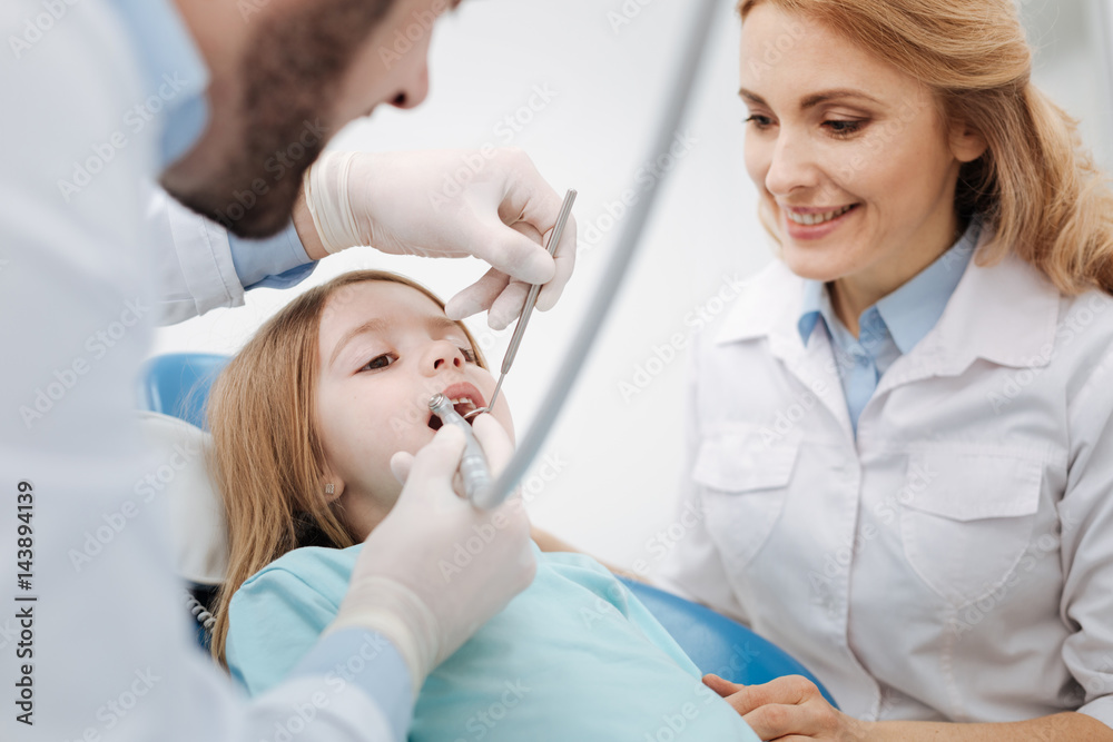 Two prominent trained dentists working in team Two prominent trained dentists working in team
