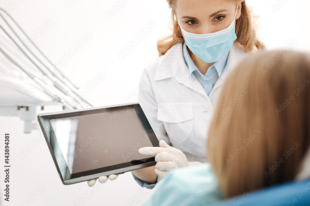 Charismatic young specialist using modern technology Charismatic young specialist using modern technology