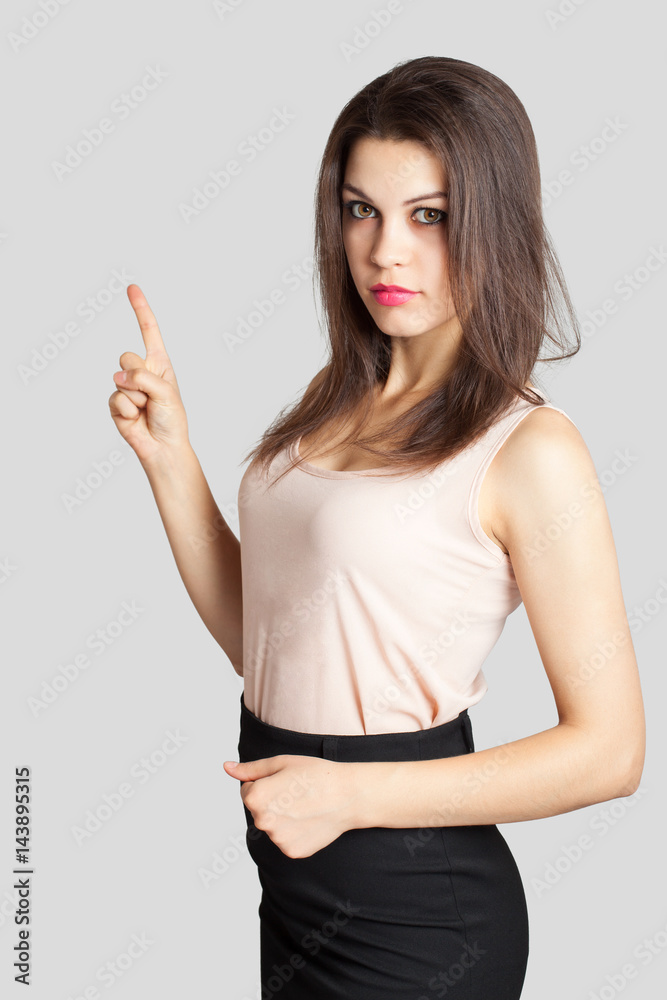 Young beautiful business woman shows up Young beautiful business woman shows up