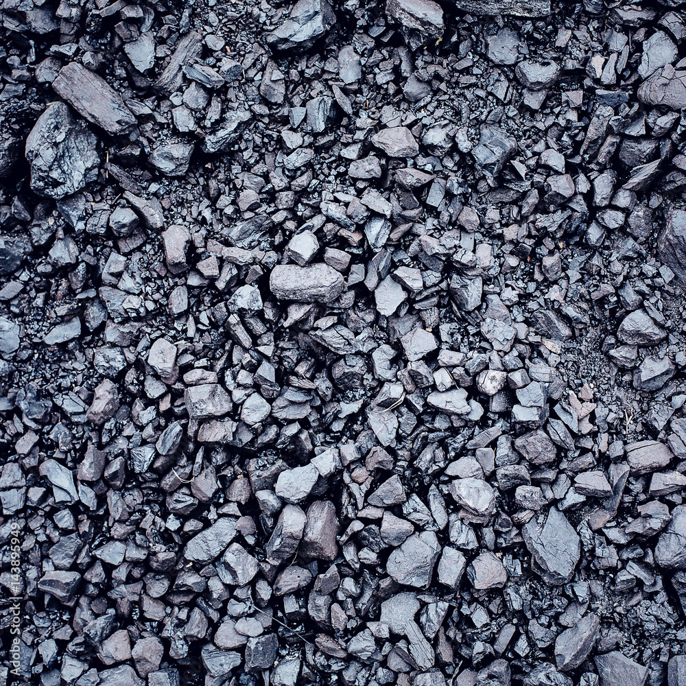 Black coal textured background Black coal textured background