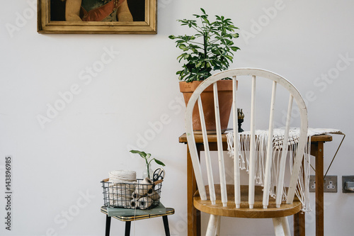 Work space with plant and weaving on desk