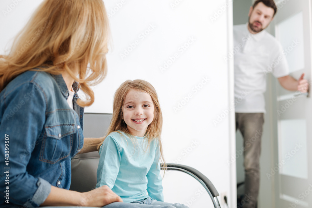 Excited pretty sweet girl meeting her doctor Excited pretty sweet girl meeting her doctor