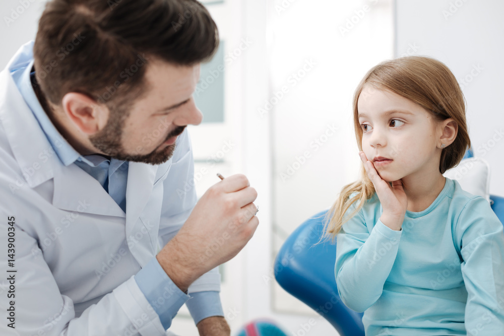 Sweet qualified doctor asking to open the mouth Sweet qualified doctor asking to open the mouth