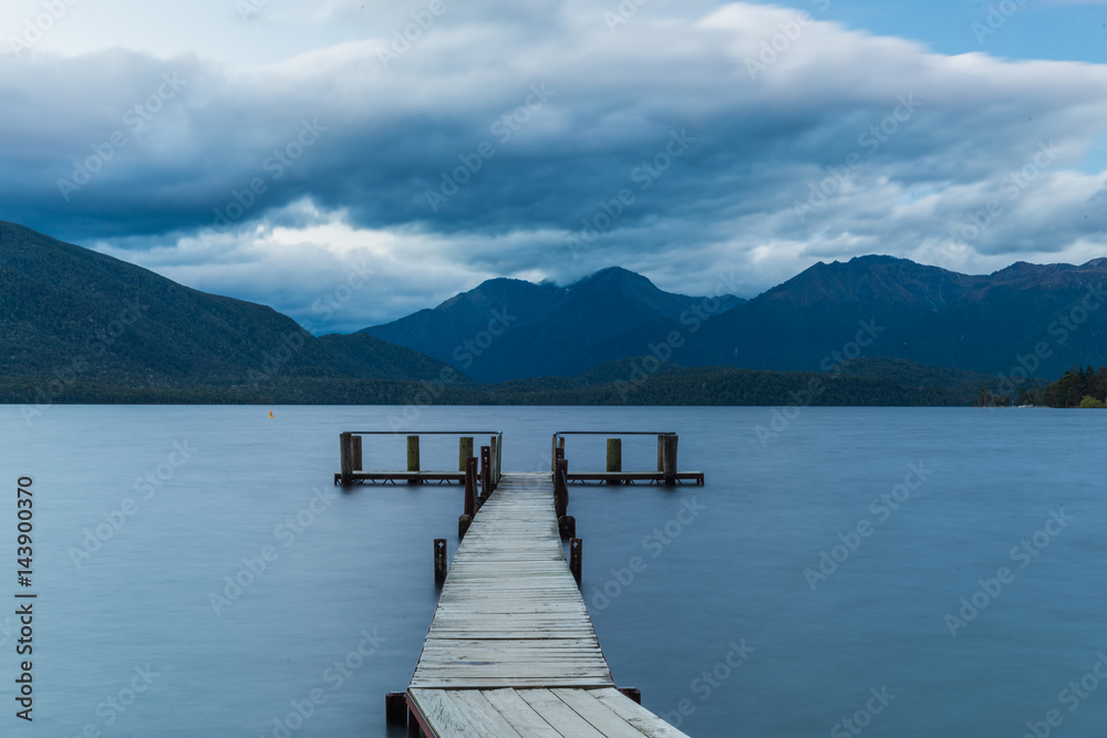 Wooden jetty at the mountain lake