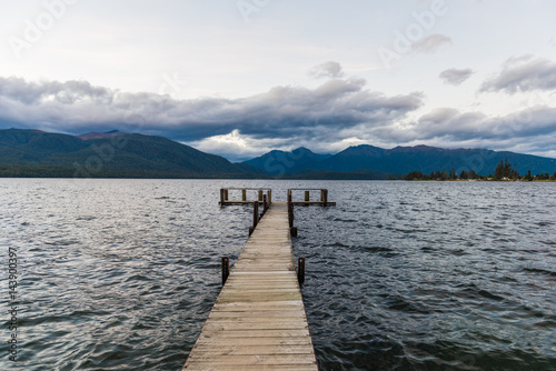 Wooden jetty at the mountain lake