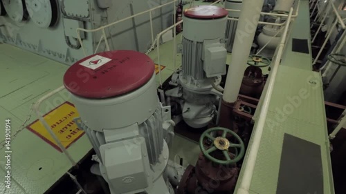 Sea water pumps in engine room of ship