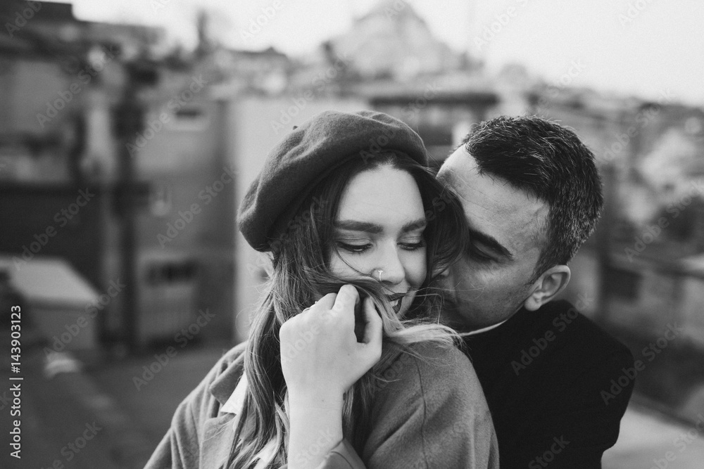Fototapeta premium Close-up touching portrait of loving couple in bw. Sensual photo