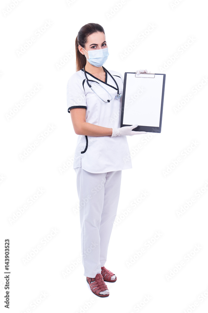 full length portrait of woman doctor in mask holding clipboard with blank paper isolated on white full length portrait of woman doctor in mask holding clipboard with blank paper isolated on white