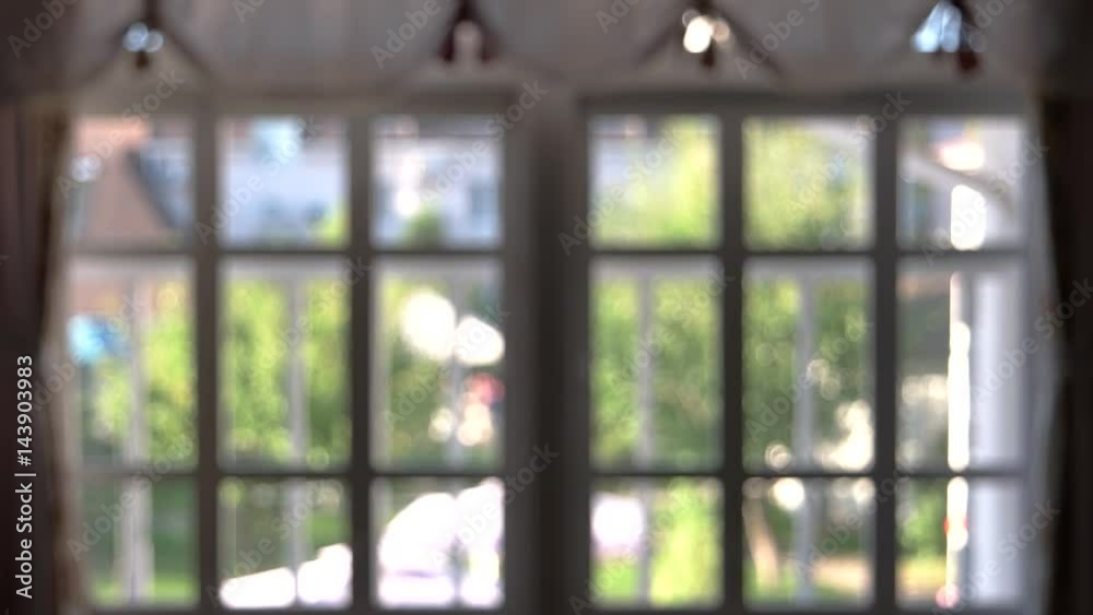 Blurred windows, interior. Blurry view from building window. Office in convenient location.