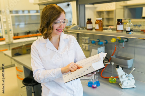Young girl in the laboratory, experiments