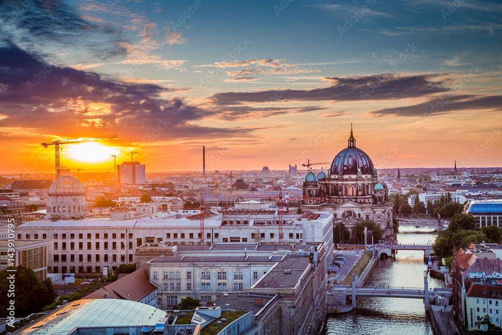Berlin rooftops view with Berlin Cathedral and Spree river at sunset, Germany