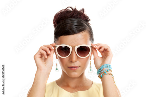 the young woman in sunglasses