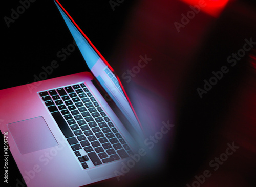 Cyber attack, laptop computer being infected by virus