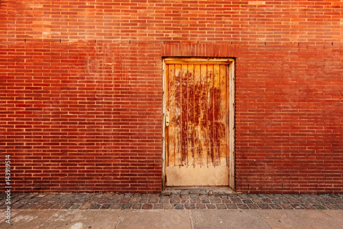 Photography Backdoor, old weathered door and brick wall
