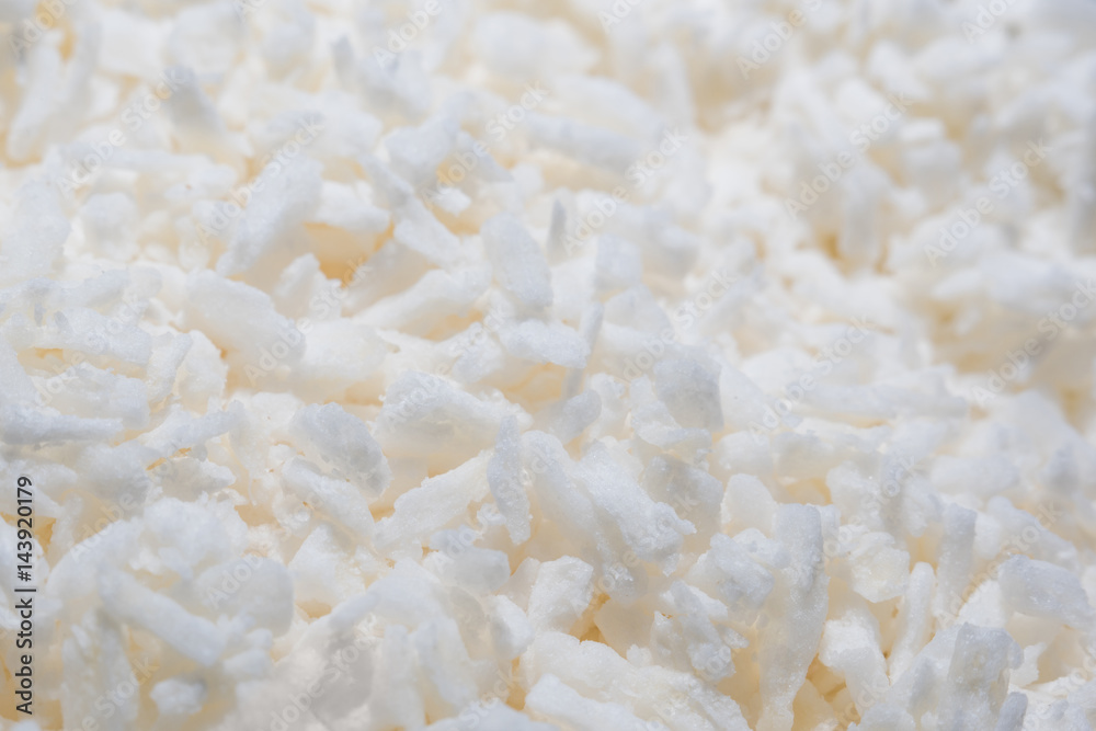 Crushed coconut chips macro - selective focus
