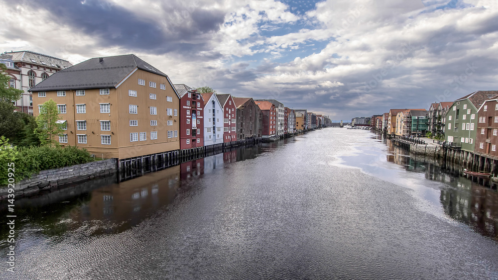 Old store houses on the river Nidelva in Old Town, Trondheim, Norway