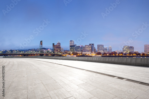 empty floor with modern cityscape and skyline