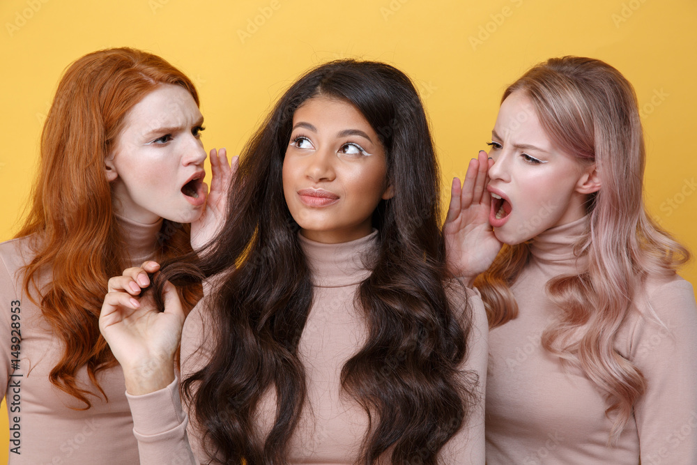 Close up portrait of Two young women screaming on friend Close up portrait of Two young women screaming on friend