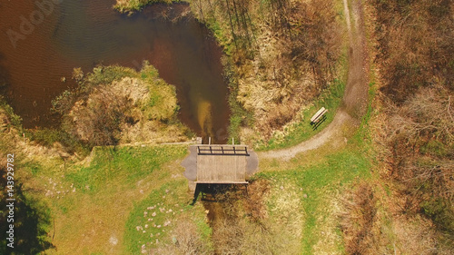 Top view of a wooden bridge at the Eutersee. The Eutersee is a little lake in south Hessia, Germany.
