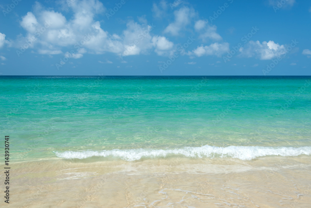 tropical sea with blue sky and clouds