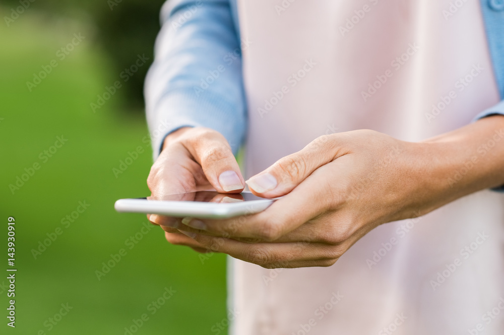 Woman hand using phone