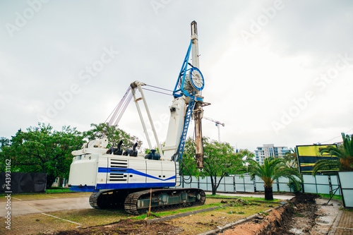 Machine for piling. Construction machinery on the site for the construction of a house.